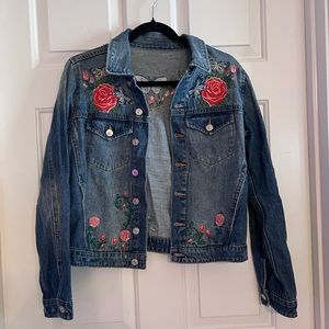 Embroidered jean jacket and a size medium